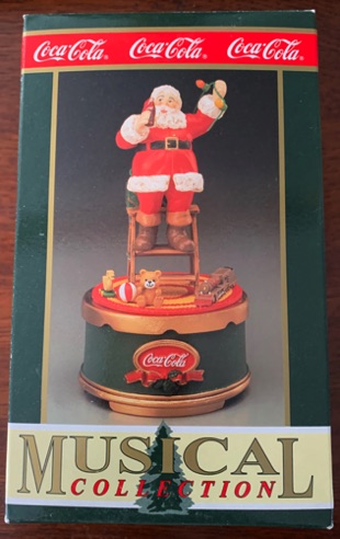 3041-1 € 27,50 ccoa cola muziekdoos opdraaibaar kerstmasn op trapje.jpeg